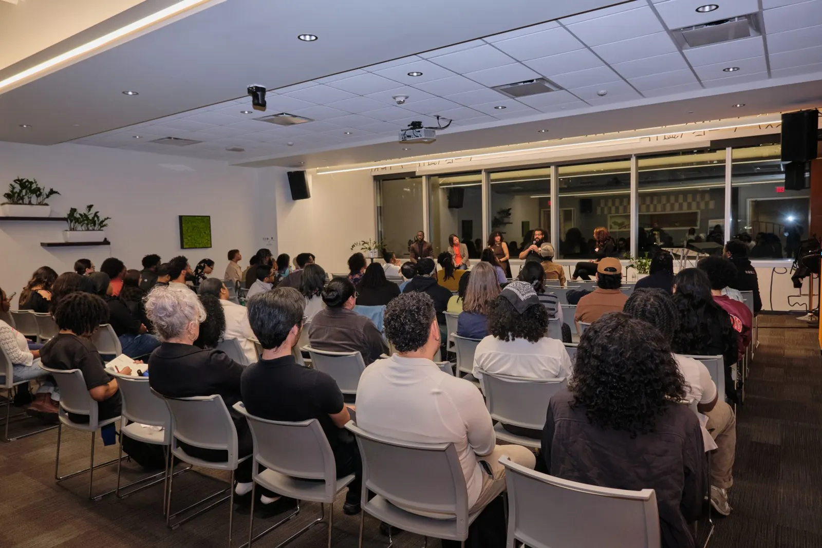 A full room of attendees at a Resilient Coders event