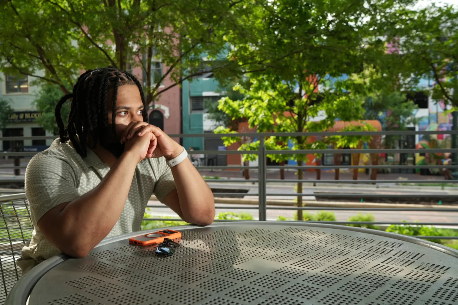 Malachi Atkinson seated at a table in Philadelphia